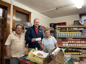 The Reedsburg Jaycees held their annual sandbox fill on May 7. On top of the food and monetary donations raised from the sandbox fill, the Reedsburg Jaycees donated $500 to the Reedsburg Area Food Pantry. (Submitted photo)