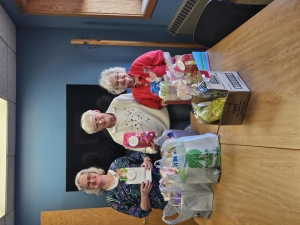 Members of the American Legion Auxiliary Unit 350, Diana Dalton, Kathy Horkan and Joanne Biesek, spent an afternoon assembling Easter goody bags to be distributed to veterans in Reedsburg nursing homes. (Submitted photo)