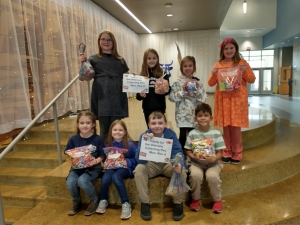 Prairie Ridge Intermediate students have been collecting Halloween candy to be delivered to the VA Hospital in Tomah. Contributions were also given to Reedsburg veterans. Front row from left are Gretchen Fulk, Maddy Miller, Ryan Latella and Hansel Garcia; back row from left: Savannah Anderson, Ashlynn Neumann, Emma Fedderly and Raegan Sikma. (Submitted photo)