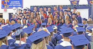 Seniors joined the RAHS Chamber Singers for a final performance before distribution of diplomas. They sang “Bridge over Troubled Waters.”