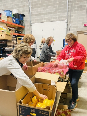 The Den at Reedsburg Area High School recently expressed its appreciation to the many volunteers who show up to pack food boxes every week. The parcels support people in the district who are struggling to afford one of the most basic necessities: Groceries. (Submitted photos)