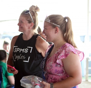 Sauk County Fairest of the Fair walks through the barns Saturday at the Sauk County Fair.