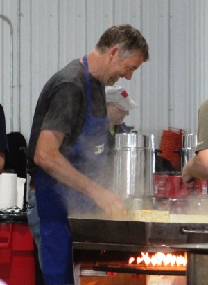 Volunteers started cooking right away at 7 a.m. Sunday for the Fly-In/Drive-In Breakfast at the Reedsburg Municipal Airport. The event is presented by the Reedsburg Area Flying Club.