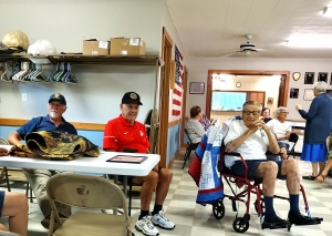 Jim Kowalczyk, Wayne Simono and Al Exner, members of American Legion Post 242 in La Valle, each recently received a quilt from the Quilts of Valor Foundation (QOVF) in Winterset, IA. More than 400,000 quilts recognizing veterans' service have been awarded to nominated veterans since QOVF's founding in 2003. For more information, visit www.qovf.org/contact-information or call 515-619-6556. (Submitted photo)