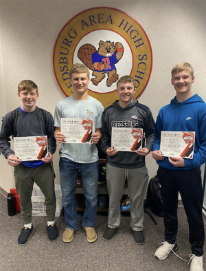 Four Reedsburg Beaver wrestlers have been recognized by the Wisconsin Wrestling Association with Academic All-State honors for the 2025-2026 season. Pictured from left to right are Braiden Hale-Toomey (1st team), Bryce Sander (honorable mention), Sam Timlin (honorable mention) and Carter Coplien (honorable mention). (School District of Reedsburg photo)