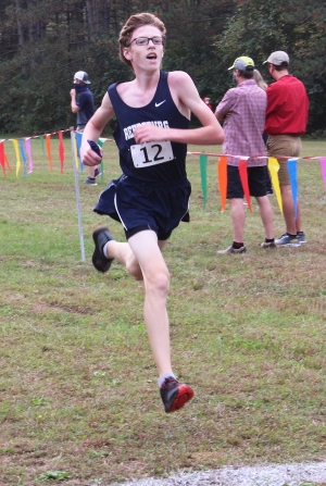 Ben Bruer races hard to the finish line for the Beaver boys cross country team in Saturday’s home meet at the Hartje Center. The freshman placed 16th overall in the five-team event which was Reedsburg’s first home meet for the season. (Photo by Troy Matz)