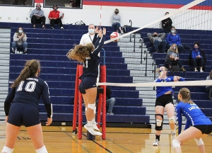Junior McKenzie Bestor (No. 3) and Macie Wieman team up for a successful block for the Beaver volleyball team in a match vs. Lake Mills last week at RAHS. Bestor had two blocks to help Reedsburg to a 3-1 match win over the visitors. (Photo by Troy Matz)