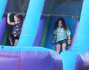 Kids enjoy the bouncy house as part of this past weekend’s Cazenovia Celebration for 2024. (Photo by Troy Matz)